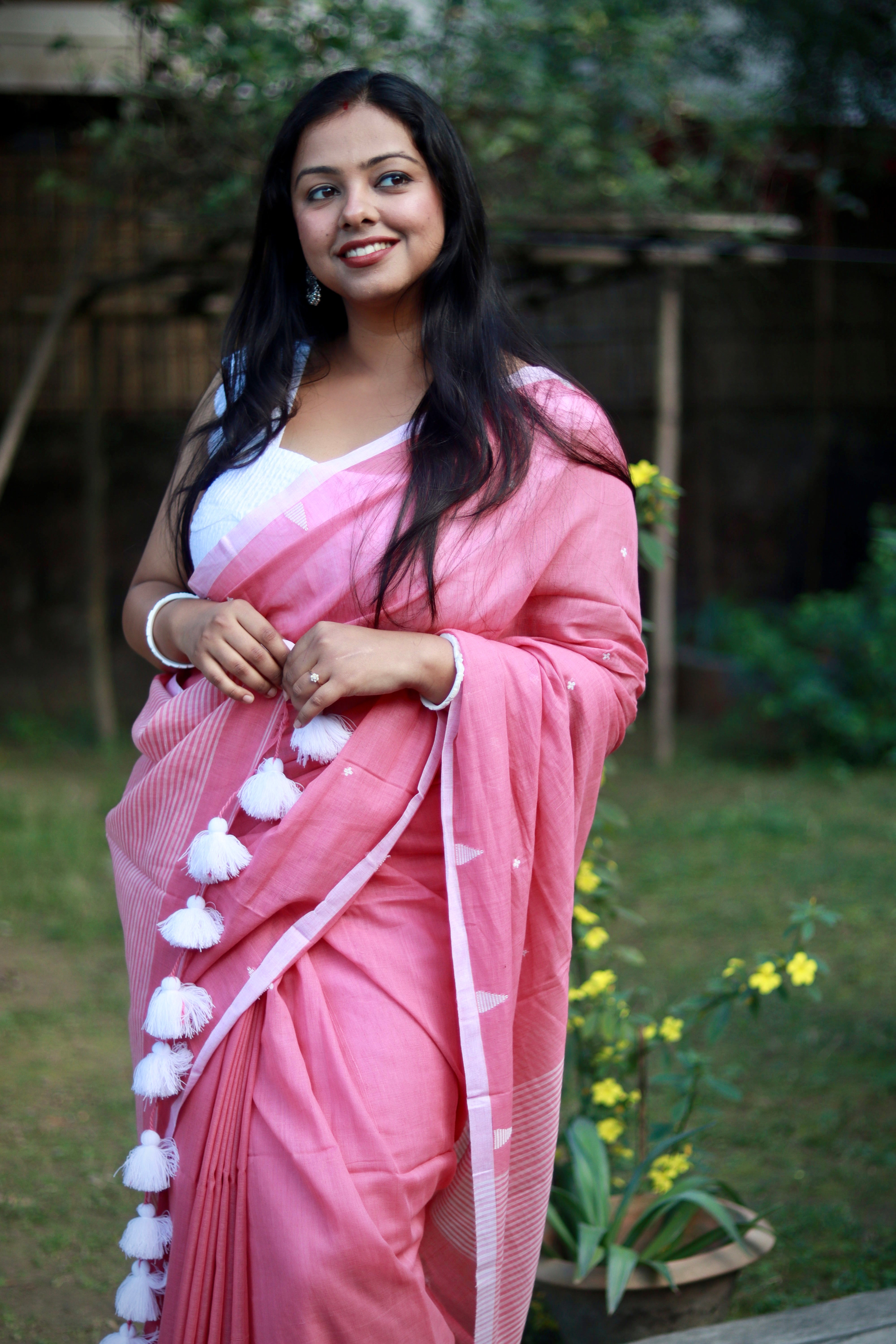 Blushed white, pure cotton handloom saree.